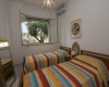 nella foto vedo una camera di una casa vacanze in torre vado in salento 