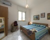 nella foto vedo una camera da letto di una casa vacanze in salento precisamente in torre vado