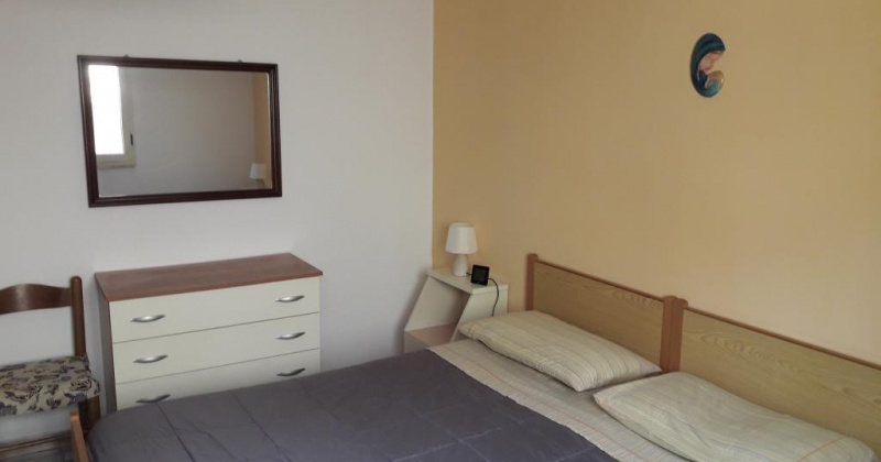nella foto vediamo una camera da letto di una casa in salentpo in pescoluse di salve