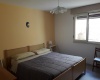 nella foto vediamo una camera da letto in pescoluse di salve bandiera blu