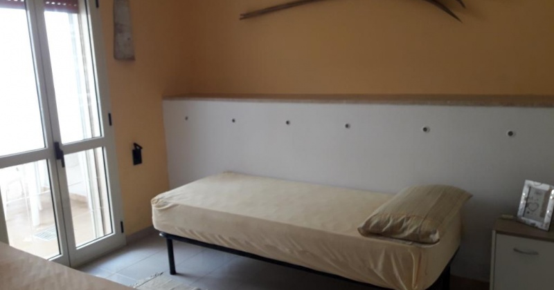 nella foto vediamo una cameretta di una casa vacanze in pescoluse